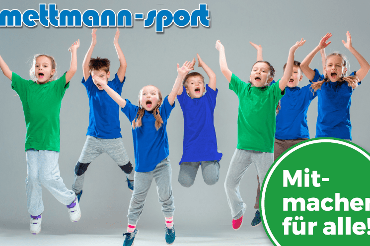 Sechs fr&ouml;hliche Kinder springen l&auml;chelnd vor grauem Hintergrund, mit farbigen T-Shirts und einem Motivationsslogan.