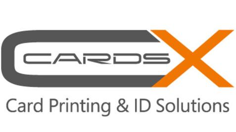 Logo von CardsX mit dem Schriftzug „Card Printing & ID Solutions“ in Grau und Orange.